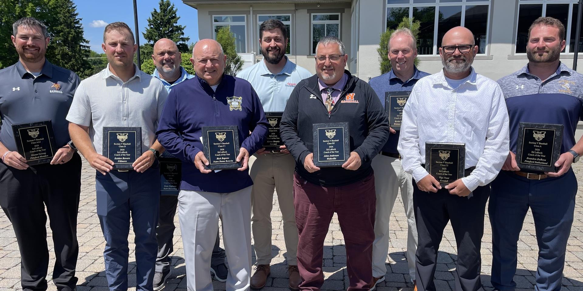 2026 Section V Class Coaches of the Year. Front (L-R): Kaiden Bowers (Fillmore/D), Rick Rapone )Notre Dame-Batavia/C1), John Anderson (Wellsville/B2) and Tige Noni (Kendall/C2). Back (L-R: Shaun Caveny (Pittsford Mendon/AA2), Sean Eighmey (Haverling/B1), Kieran Murphy (Fairport/AAA), Kevin Neenan (Webster Thomas/AA1) and Brandon DeRosa (Pittsford Sutherland/A). (Photo: Paul Gotham).
